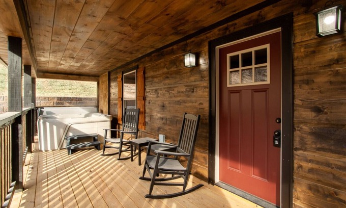 Sevierville Cabin | Rustic-Chic Retreat with Hot Tub, Stone Fireplace & Game Room