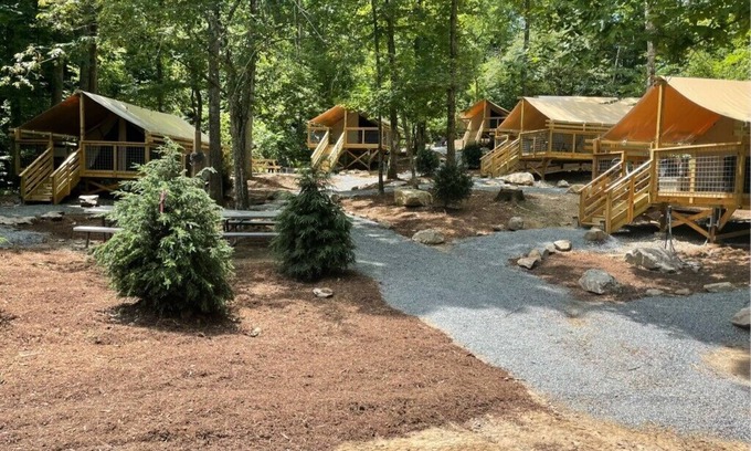 Saluda RV Rental | Rustic Glamping Tent nestled in the beauty of the Green River Gamelands!
