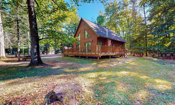 Mercer Cabin | Rustic resort cabin with lake views, deck & access to docks, canoe, paddle boats