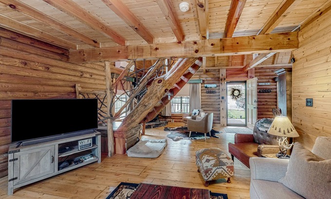 Tiger Cabin | Rustic retreat with mountain views, hot tub, grill, fireplace, central AC, & W/D