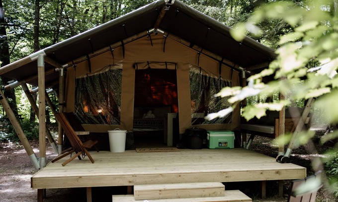 North Woodstock RV Rental | Safari Tent Site 12 | 1 King Bed | Woods View