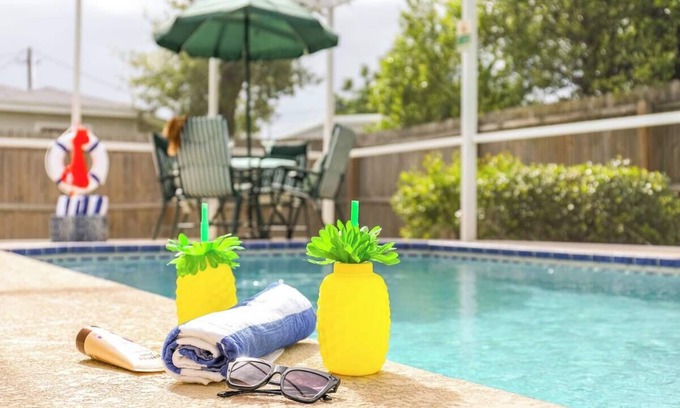Palm Harbor House | SaltyTide Getaway | Nightlife, Pool, Play, Beach