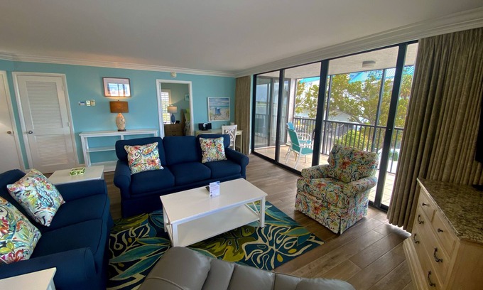 Punta Rassa Condo | Sanibel Harbour Resort: Bay View Tower 231: Beachfront Condo with pool and water views