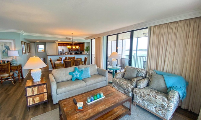 Punta Rassa Condo | Sanibel Harbour Resort Bay View Tower 837: Unwind & recharge in the wrap-around lanai.