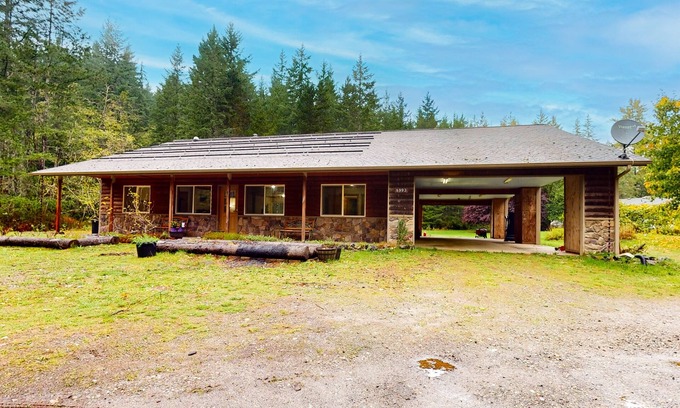 Port Orchard House | Scenic dog-friendly home with forest views, firepit, wood stove, & W/D