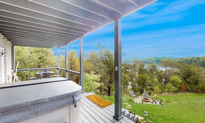 Sevierville Cabin | Scenic Douglas Lake home w/deck, hammocks, & hot tub - free attraction tickets