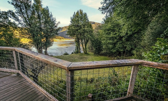 Gold Beach Cottage | Scenic River Retreat w/Deck View Lawn Games Wood Stove