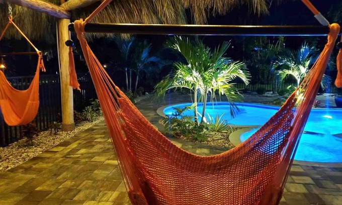 Fort Myers Beach House | Seabreeze Yes Plz! Private, Spacious Family 4 Bdrm 4 Ba Pool Home w Spa & Tiki!