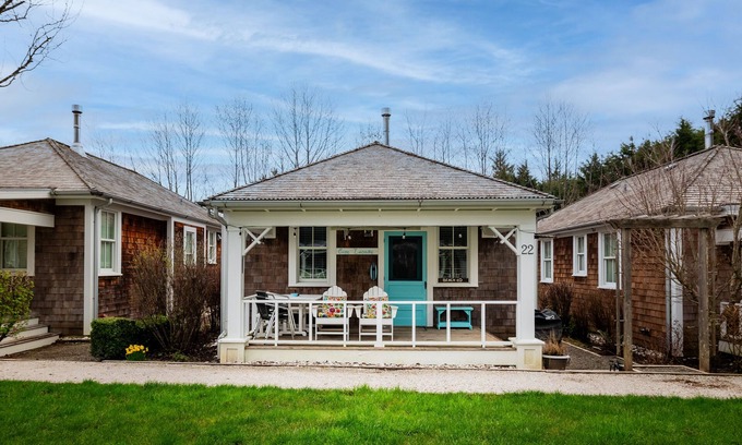 Seabrook House | Seabrook's Cape Escape a cozy 2-bedroom home with a covered porch!