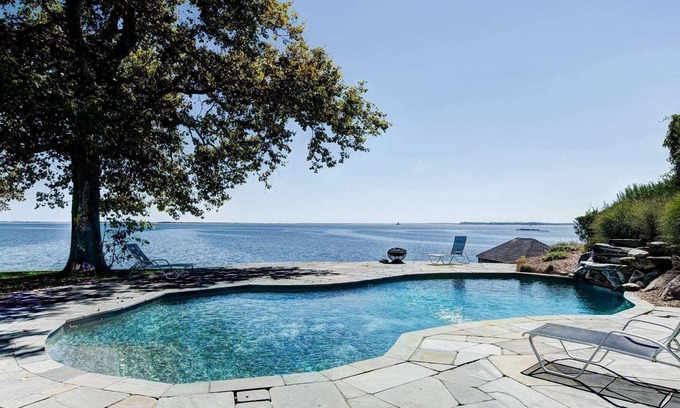 East Marion House | Seas the Day at this water front home with sweeping views of the Bay