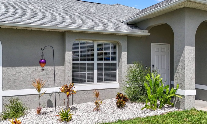 Trafalgar House | Seas the Day! Heated Pool Home on Canal 4 bedroom/2 Bath