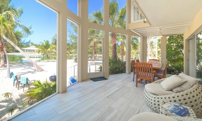 Rum Point House | Seaside Dreams: Contemporary Oasis on Bio-Bay With Two Free Kayaks