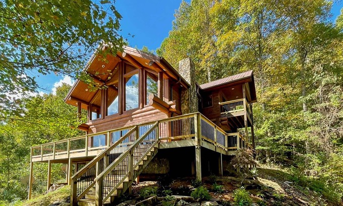 Almond Cabin | Secluded log cabin with fireplace and hot tub on deck.