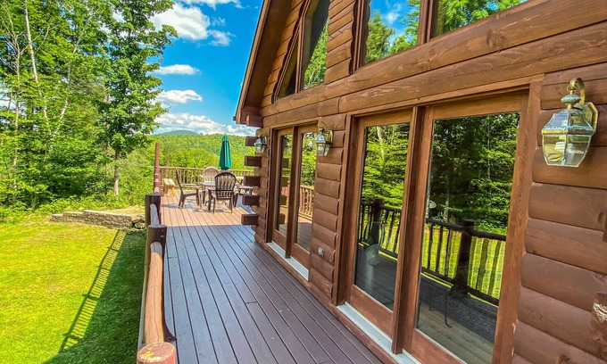 Johnsburg House | Secluded Log Cabin with hot-tub. Near Lake George. Amazing Mt View. Sleeps 15