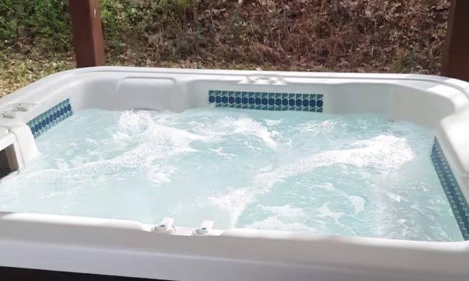 Marshall House | Secluded Magnolia Cabin & Hot Tub