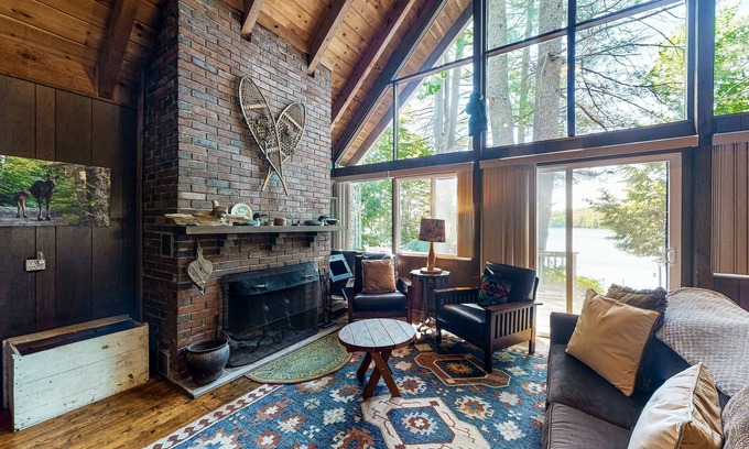 Parsonsfield House | Secluded waterfront cabin with private dock, kayak, canoe, gas grill & deck