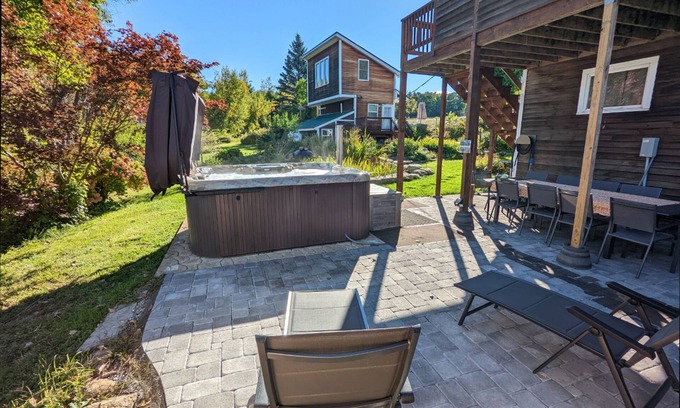 Gilford House | Serene estate with cottages, kitchens, pool, hot tub, fire tables, & views