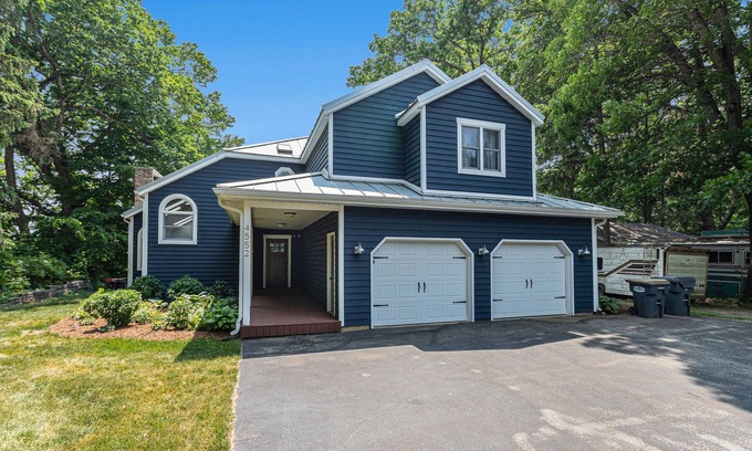 Berrien Springs House | Serene lakefront retreat with an expansive deck, dock access, game room, & AC