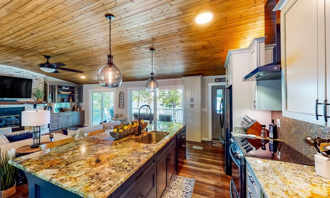 Leesville House | Serene lakefront retreat with dock, firepit, furnished deck, gazebo & boathouse