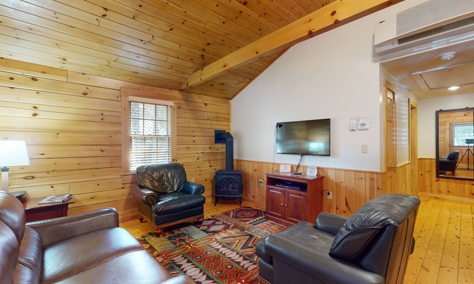 Northport Cabin | Serene two-bedroom dog-friendly cabin getaway with kitchen, fireplace & more