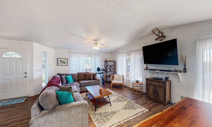 Port Orford House | Serene waterfront haven with lake views, fenced yard & home office