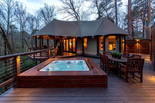 Mid America Other | Serenity for Friends: Luxe Tented Cabin and Hot Tub Delight in Hot Springs, AR