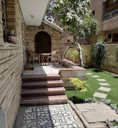 Taqseem Laselky Apartment | Serenity Garden Oasis near Maadi Grand Mall & CAC
