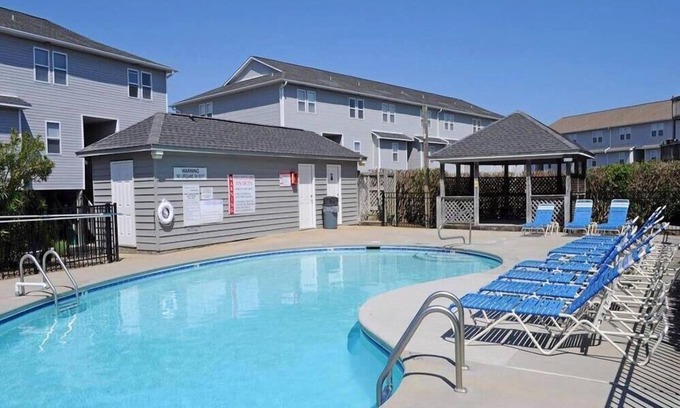 Surf City House | Shangri La - 2BR Turtle Cove Townhouse Near Pool