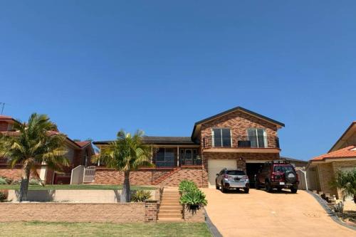 Blackbutt House | Shellharbour. Ocean, lake and mountain view