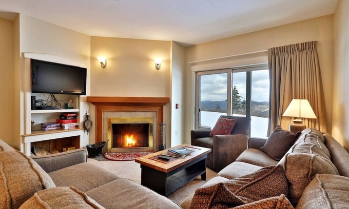 Ludlow House | Ski on/Ski off Solitude Condo with Fireplace