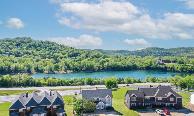 Holiday Island Condo | Sleeps 19 & location can’t be beat! Walk to water & marina.Summer booking fast!