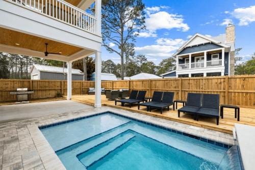 San Juan House | Sleeps 34 2 Homes Private Pools Firepit Golf Cart Walk to Beach Seagrove San Juan by AvantStay