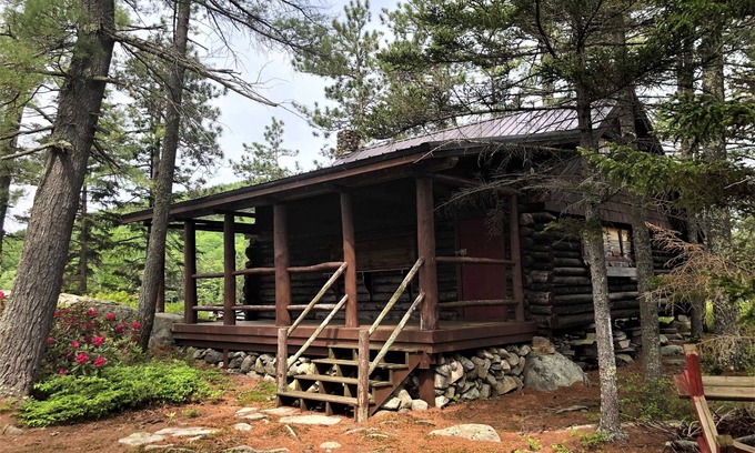 Bryant Pond Cabin | Small private Island on scenic Maine pond with charming authentic log cabin.