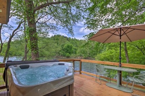 Cherokee House | Smoky Mountain Cabin with Hot Tub and River Views!