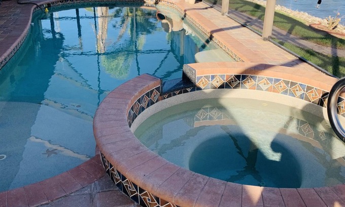 South Gulf Cove House | SO. GULF COVE - WATERFRONT HOME ON CANAL-SALT WATER POOL & SPA-NEAR GULF BEACHES