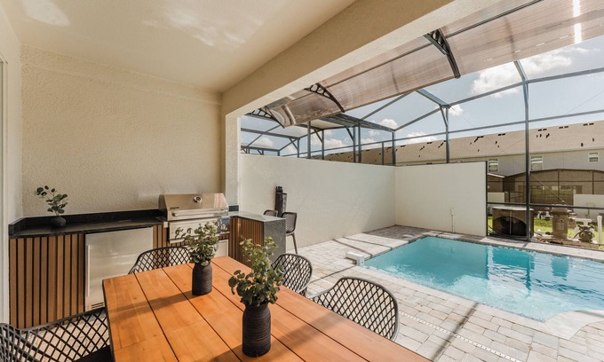 Davenport House | Solara Themed 6BR Near Disney Pool SummerKitchen
