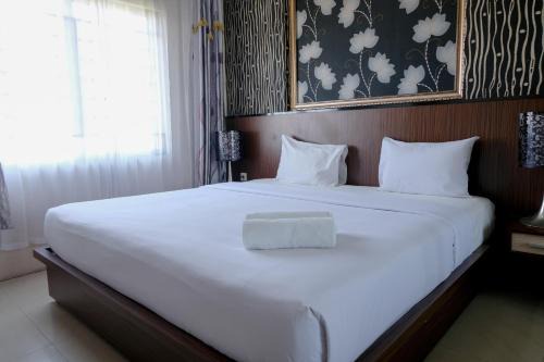 Cimahi Apartment | Spacious and Combine 3BR at The Edge Bandung Apartment By Travelio