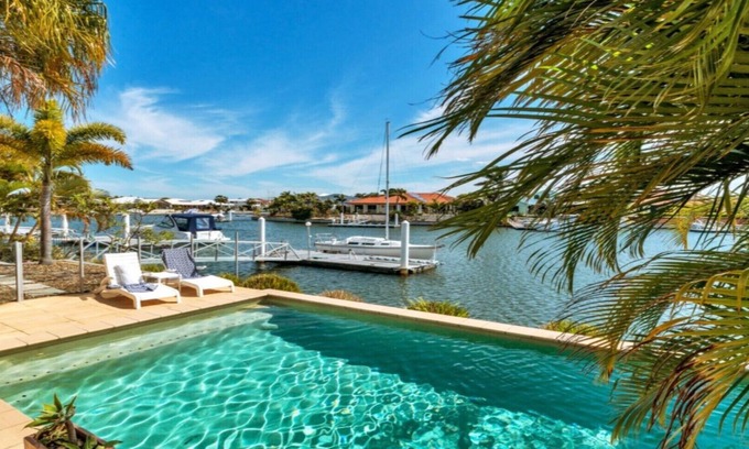 Banksia Beach House | Spacious Canal Home with Pool