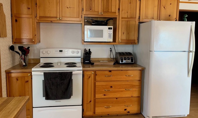 Algoma District Cottage | Spacious family cottage with huge deck on a beautiful lake. Pet friendly!