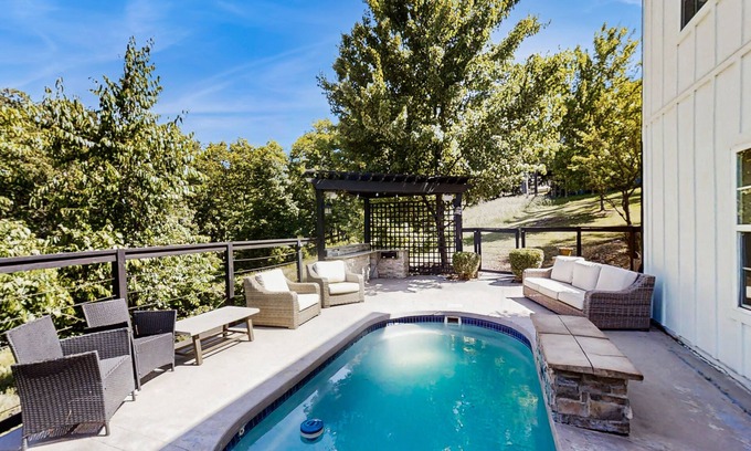 Rogers House | Spacious family retreat w/pool, BBQ grill, patio, deck, near Beaver Lake