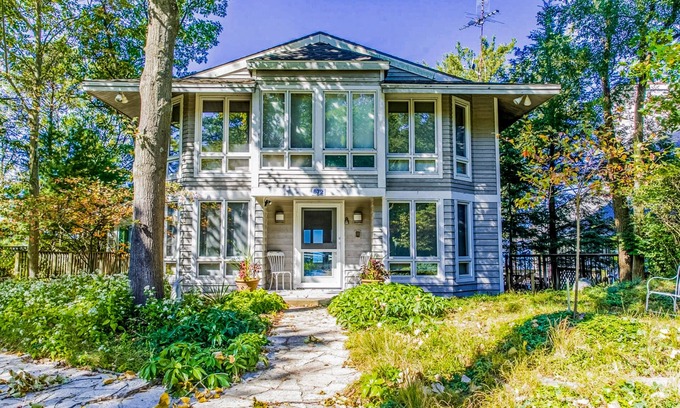 Shorewood-Tower Hills-Harbert House | Spacious lakefront home with private beach, hot tub, fire table, & views