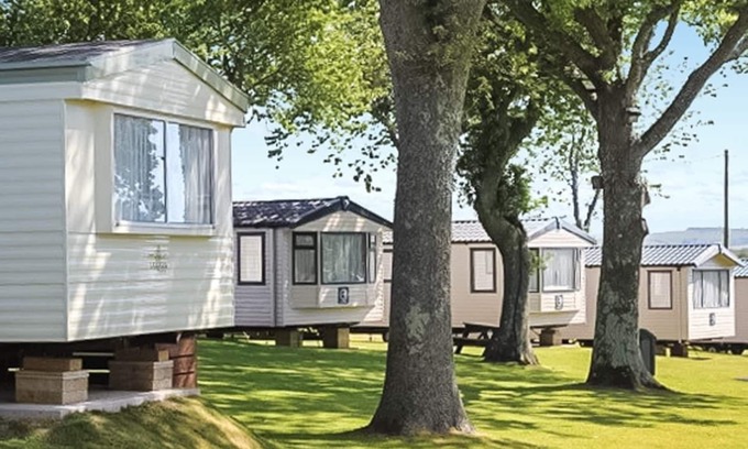 Sandown House | Spacious modern caravan with one double and two twin.
