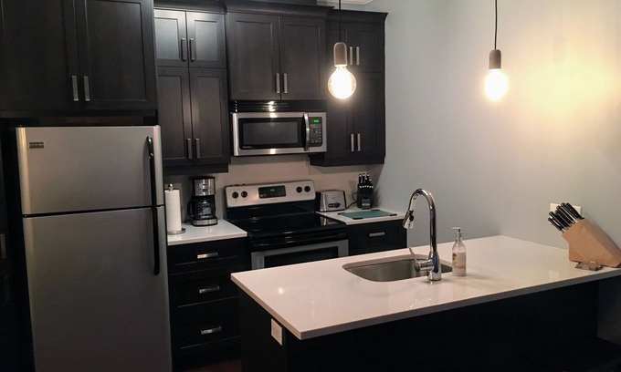 Bromont Condo | Spacious Mountain View Condo Heated Pool & BBQ - Ski, Golf, Cycling, Water Park