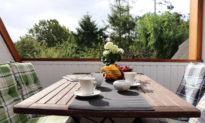 Ostseebad Ahrenshoop Apartment | Spacious vacation apartment with a view of the Bodden