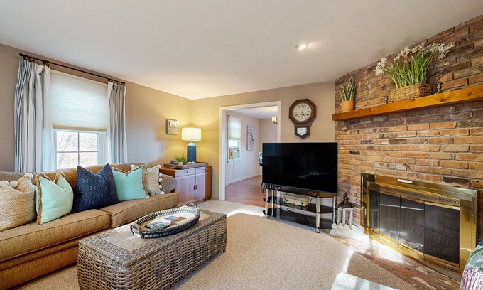 Sagamore Beach House | Spacious wooded retreat near canal & beach with deck & alfresco dining