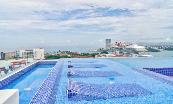 North Hotel Zone Condo | Spectacular beach and mountain view Condo - 5 min from the beach