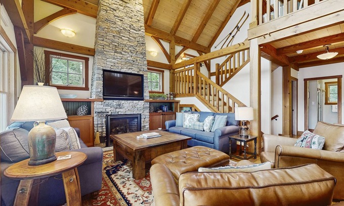 New Hampton House | Spectacular lakefront home w/private dock, beach, swim platform, gazebo & porch