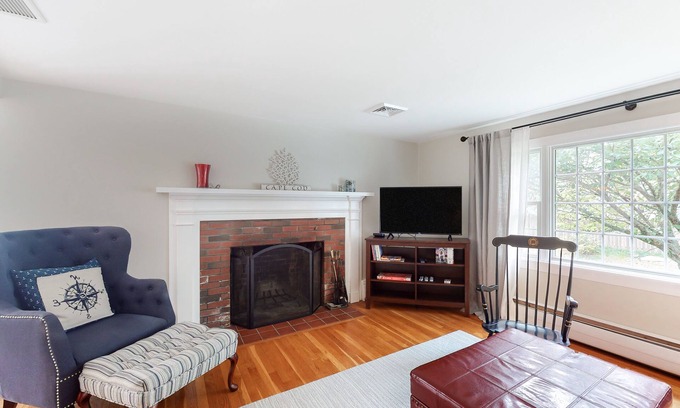 Falmouth House | Split-level home near the beach with WiFi, furnished deck & central AC
