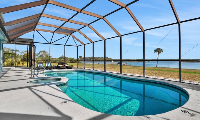 Edgewater House | Sprawling intercoastal home with boat lifts, pool and hot tub