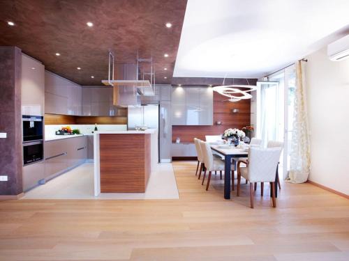 Sala Comacina Apartment | State of the art home suite with 180 degree panoramic lake view, pool and spa sleeping up to 10 guests by Italian Apartments